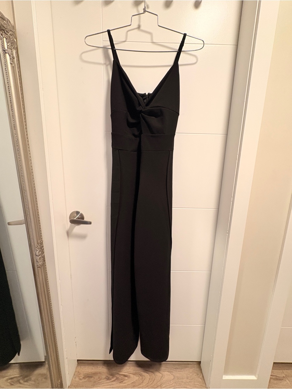 Black Women's Jumpsuit with Twist Front and side slit legs
Never worn